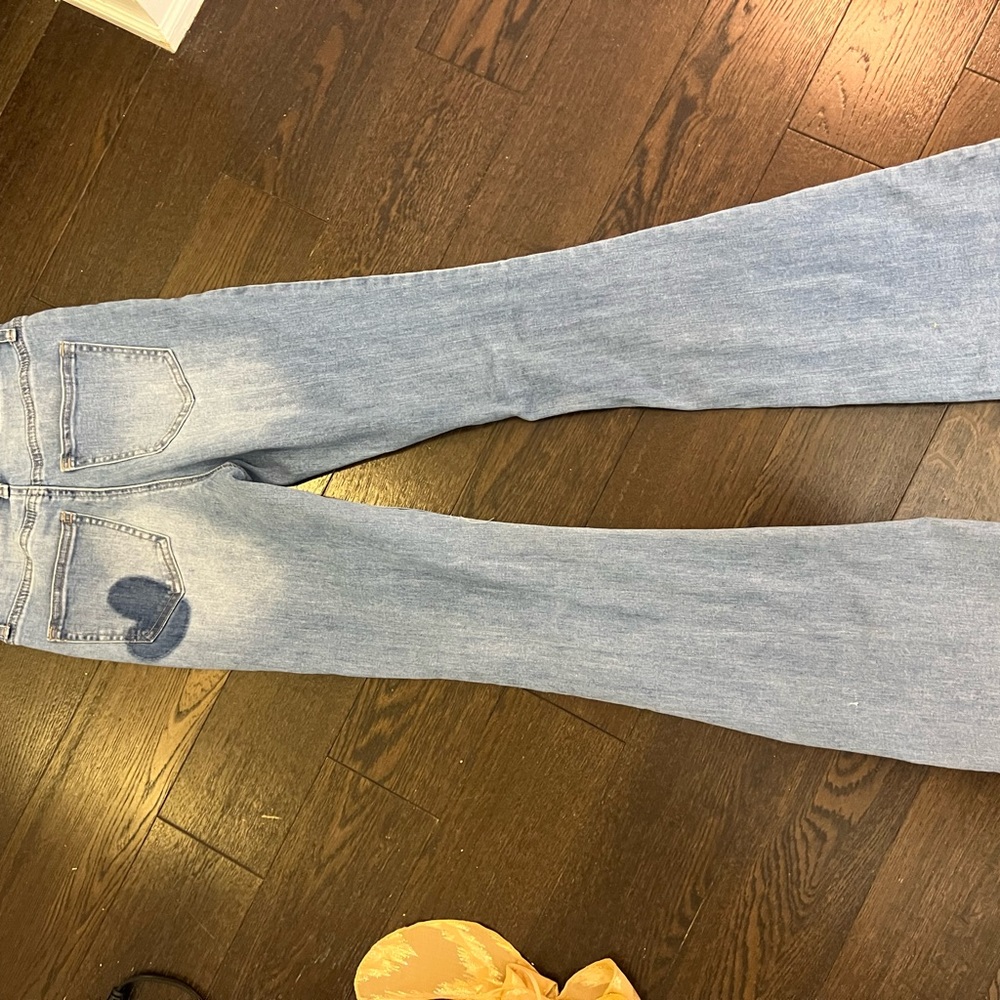 Super cute heart logo on back pocket jeans. Flare